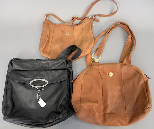 Three leather bags including Carolina Herrera tan leather handbag, Pierre Balmain tan leather purse...