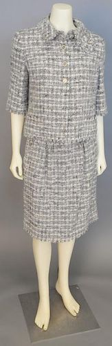 Chanel two piece tweed boucle suit, grey and white with jacket and skirt.