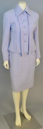 Chanel two piece boucle suit, lilac jacket and matching skirt.