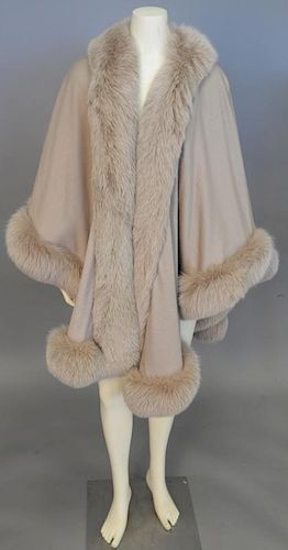 Tan wool wrap / cape with fur trim.