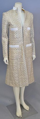 Custom designer womens gold and silver long coat with silk liner.