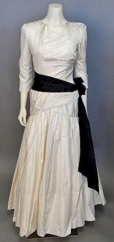 Christian Dior, Spring/Summer 1986, Evening dress of cream silk, with a wrapped effect across the bodice front. The skirt is gathered into the bodice 