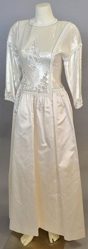 Chanel ivory silk satin evening gown with sequined flower top and long sleeves.
