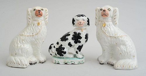 PAIR OF STAFFORDSHIRE POTTERY SPANIELS