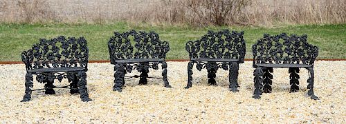 GROUP OF FOUR CAST-IRON GARDEN SEATS, LATE 20TH CENTURY