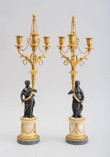 PAIR OF LOUIS XVI STYLE GILT-BRONZE MOUNTED MARBLE AND BRONZE THREE-LIGHT CANDELABRA