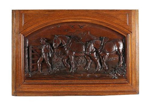 A Black Forest Style Carved Panel in Oak Frame Height 26 1/2 x width 38 inches.