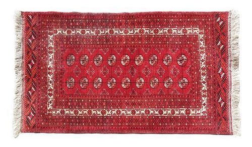 A Turkoman Wool Rug 6 feet x 3 feet 6 inches.