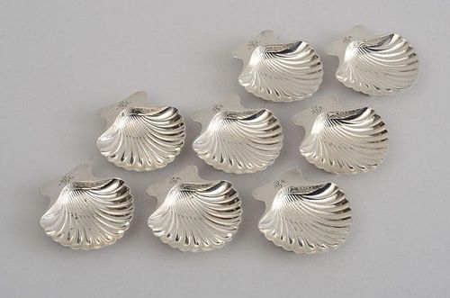 ASSEMBLED SET OF EIGHT TIFFANY & CO. MONOGRAMMED SILVER SHELL-FORM INDIVIDUAL ASHTRAYS