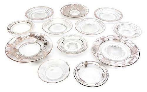 * A Collection of Silver Overlay Glass Plates Diameter of largest 9 3/4 inches.