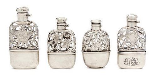 * Four Silver Overlay Glass Flasks Height of tallest 4 3/4 inches.