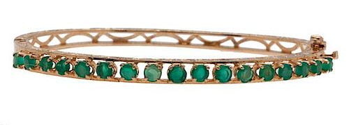 Bangle Bracelet in 14 Karat Yellow Gold with Emeralds 