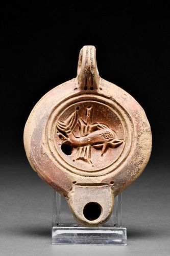 ROMAN TERRACOTTA OIL LAMP WITH DOLPHIN AND RUDDER