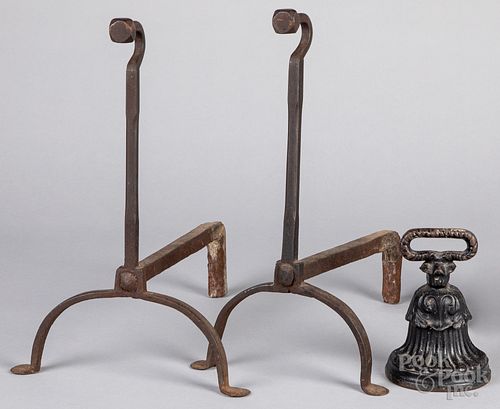 Pair of cast iron penny foot andirons, 18th c.