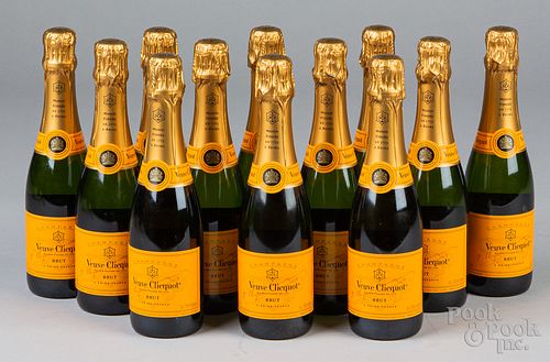 Twelve Veuve Clicquot Brute Champagne bottles