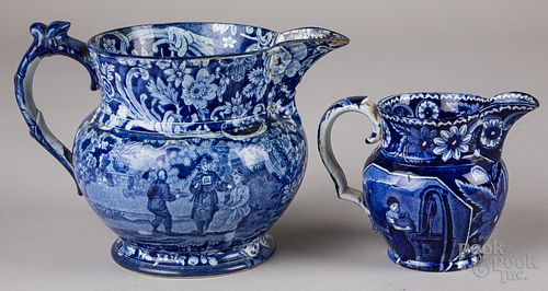 Two blue Staffordshire pitchers
