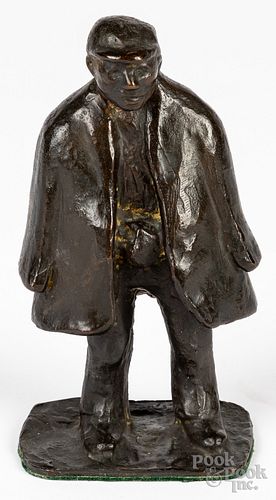 Bronze gentleman in overcoat