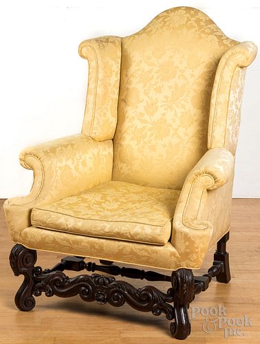 Jacobean style wing chair.
