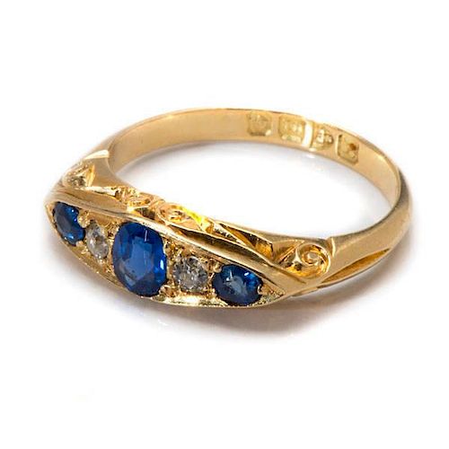 Ladies 18 Karat Yellow Gold Hand-Carved Sapphire and Diamond Ring 