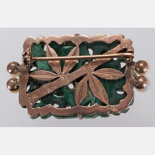 A Carved Malachite and Pearl Brooch,