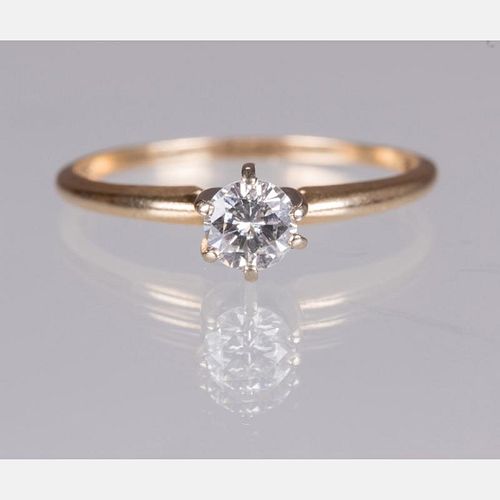 A 14kt. Yellow Gold and Diamond Ring,