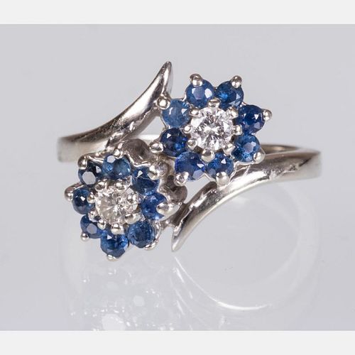 A 14kt. White Gold, Diamond and Sapphire Ring,