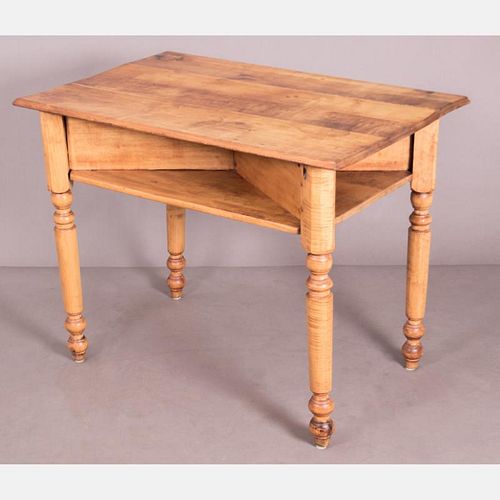 An American Maple Table, 19th Century.