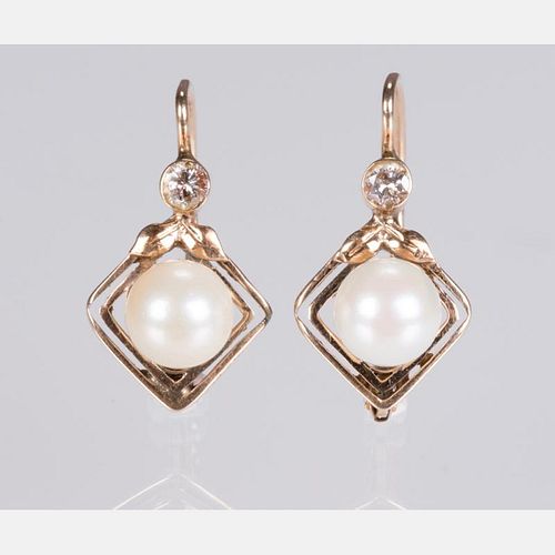 A Pair of 14kt. Yellow Gold, Diamond and Pearl Earrings.