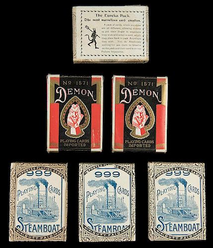 Six Magic Playing Card Decks. Including four mint sealed Steamboat Eureka packs and two No. 1571 Demon playing card decks.
