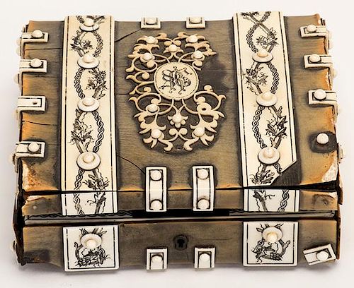 Cased Set of Ivory Chips. India, ca. 1880. Consisting of 16 chips, eight rectangular and eight rounded, as used to play Chaupat or Viz-Gap-Tam. Housed
