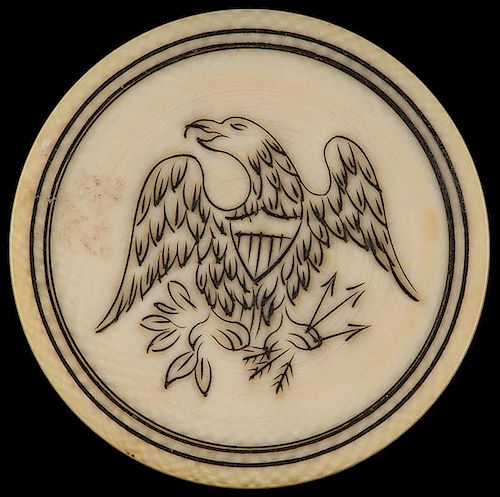 Eagle Ivory Poker Chip. American, ca. 1880. With an ornate scrimshawed eagle design inside two concentric circles. 1 _î diam. Rare. Excellent.