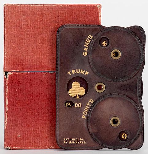 Leather Whist Marker in Original Box. S.W. Hyatt, 1884 (patent date). Three wheels keep track of games, trump and points. Excellent.