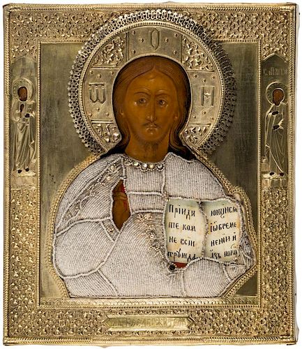 A RUSSIAN ICON OF CHRIST PANTOCRATOR IN A BEADED OKLAD