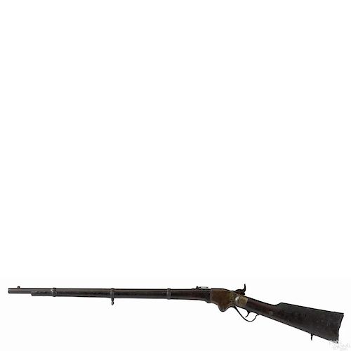 Spencer military repeating rifle, .52 cal., with a full walnut stock and tubular magazine