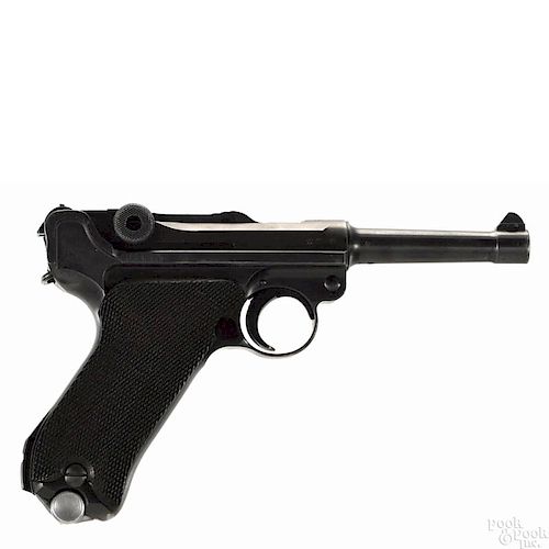 P-08 German Luger semi-automatic pistol, 9 mm, with a blued finish and checkered walnut grips