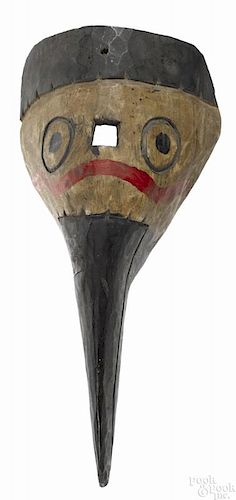 Northwest Coast carved and painted bird mask, 20th c., 15 1/4'' l.