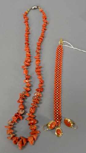 Coral and gold lot including one necklace, one bracelet, and pair of earrings set in 18K gold.