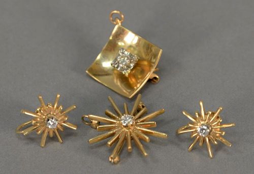 14K gold four piece lot including two earrings and two pendants, each mounted with small diamond, 13.9 grams.