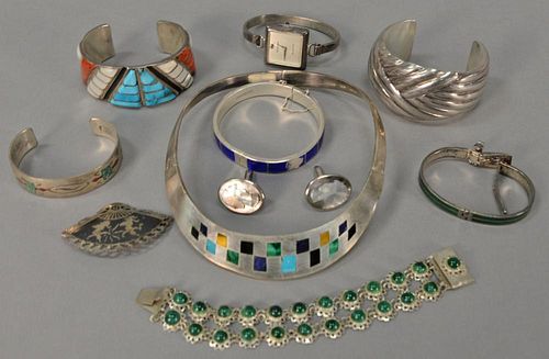 Silver lot including six bracelets, necklace, wristwatch, pin, and pair of cufflinks.