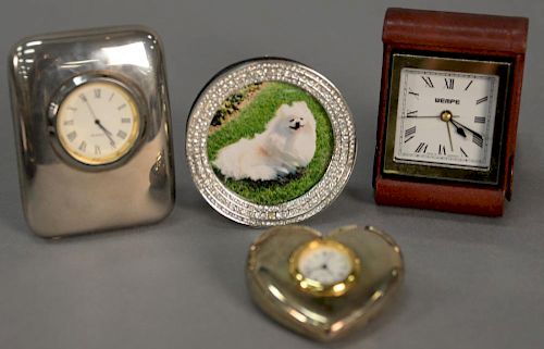 L'objet silver frame with stones around frame, two quartz desk of table clocks and a Wempe travel clock