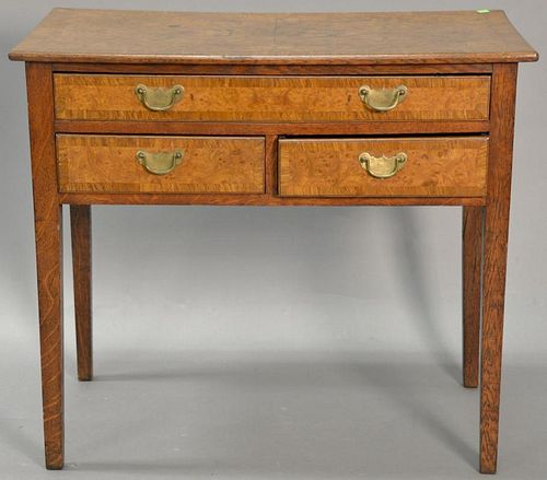 Continental one over two drawer table having burl walnut top and drawer front