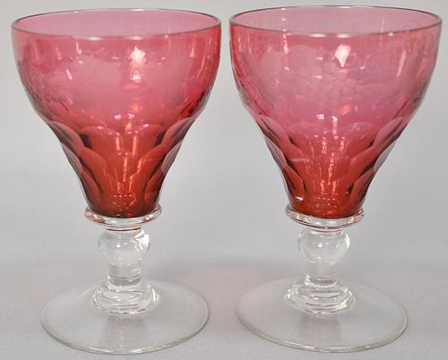 Set of ten cranberry stemmed goblets with etched grape designs, ht
