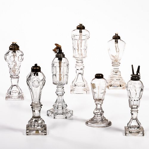 Seven Colorless Glass Lamps