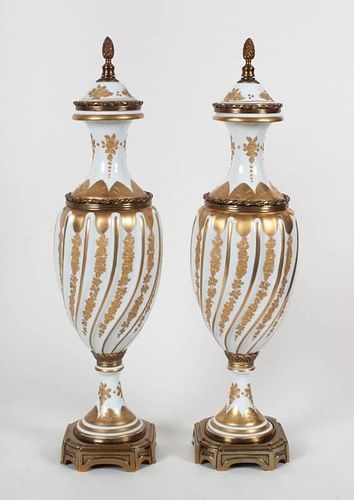 Pair of Limoges porcelain urns