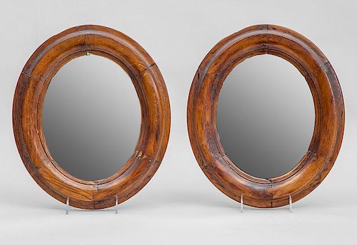 Pair of Victorian Stained Wood Small Oval Mirrors