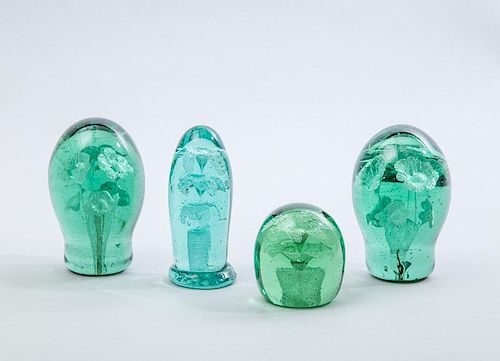 Group of Four Green Glass Paperweights