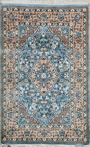 Group of Three Small Persian and Caucasian Carpets