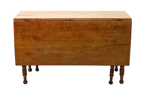 An American Tiger Maple Gate-Leg Table Height 28 1/4 x width 47 1/2 x depth 20 inches