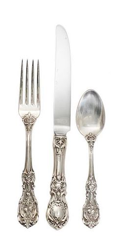 An American Silver Flatware Service, Reed & Barton, Taunton, Mass., comprising: 12 dinner knives 11 dinner forks 12 salad forks