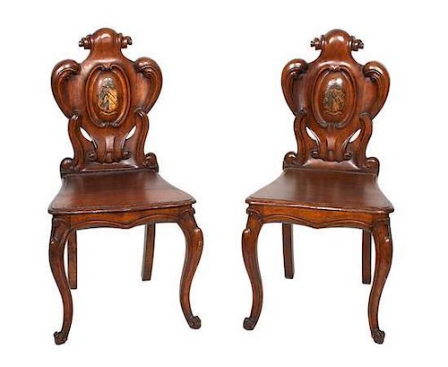 A Pair of Renaissance Revival Carved Oak Side Chairs Height 35 1/2 inches